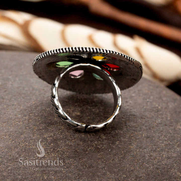 A colourful oxidised adjustable floral ring featuring hand-engraved petal patterns and dazzling multi-gemstone highlights, making it a vibrant statement piece - Sasitrends