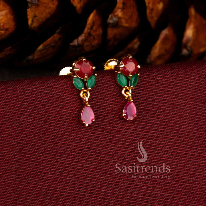 Sovereign gold look earrings in ruby-green crafted with floral AD cluster and radiant brilliant teardrop finish – Sasitrends