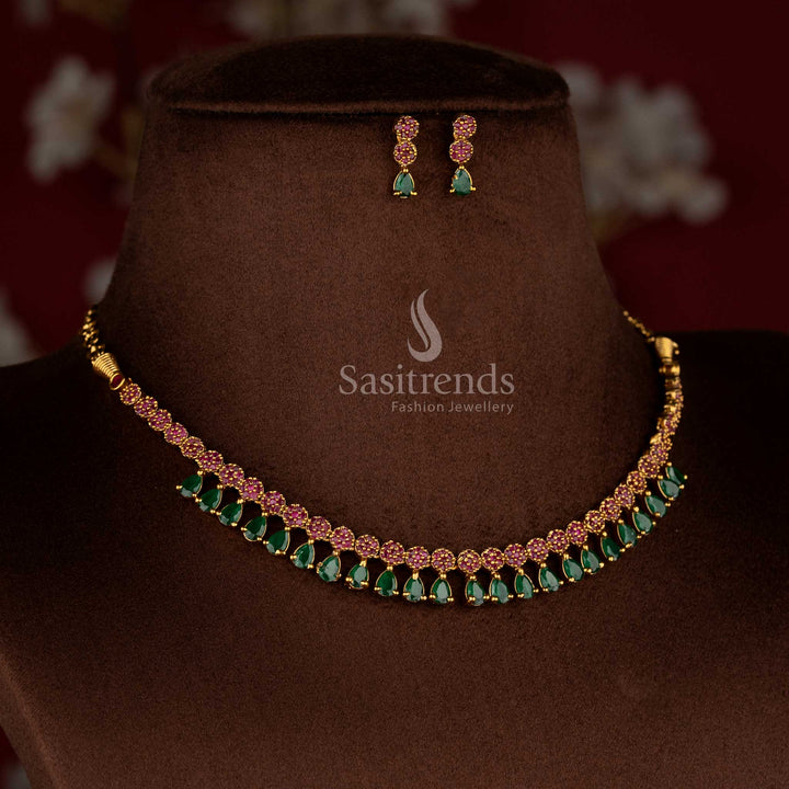Opulent American diamond matte gold plated ruby-green teardrop necklace set with designer earrings for party and celebration-ready saree styling – Sasitrends