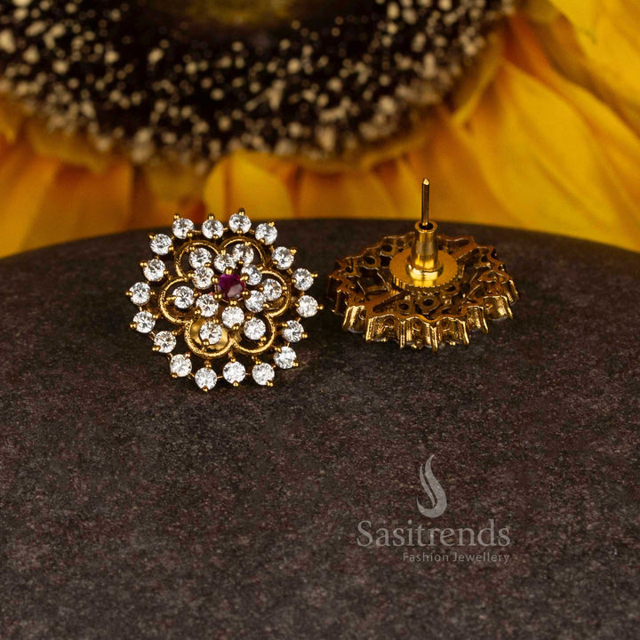 Vibrant ethereal bloom matte gold plated temple circular floral stud earrings with white-ruby stones adding traditional festive grace - Sasitrends