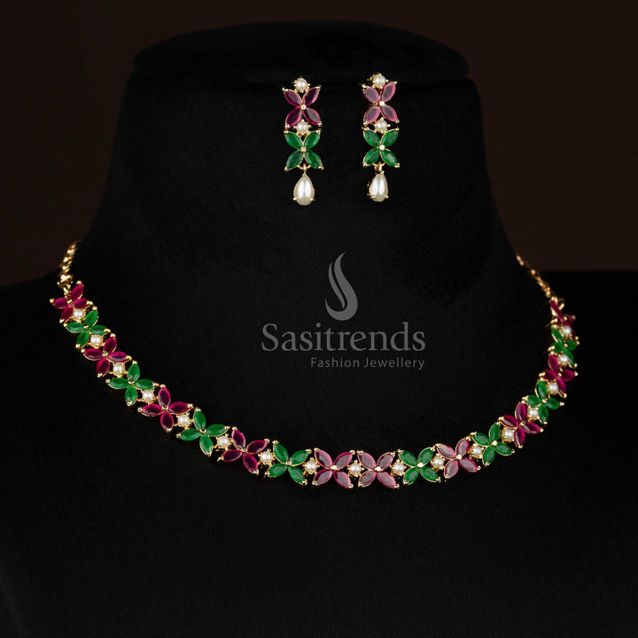 Regal micro gold plated ruby-green four petal AD floral necklace set with pearls designed for party styling and festive ethnic wear -Sasitrends
