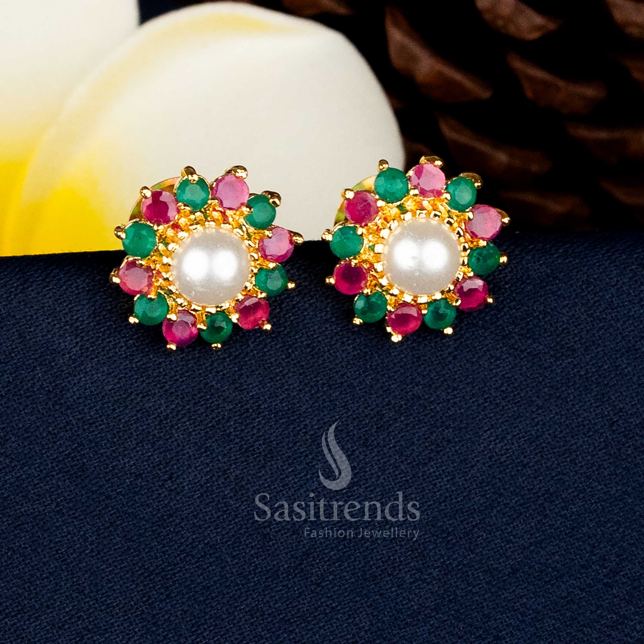 Opulent pearl ruby green micro gold plated round flower AD stone and pearl stud earrings ideal for festive styling – Sasitrends