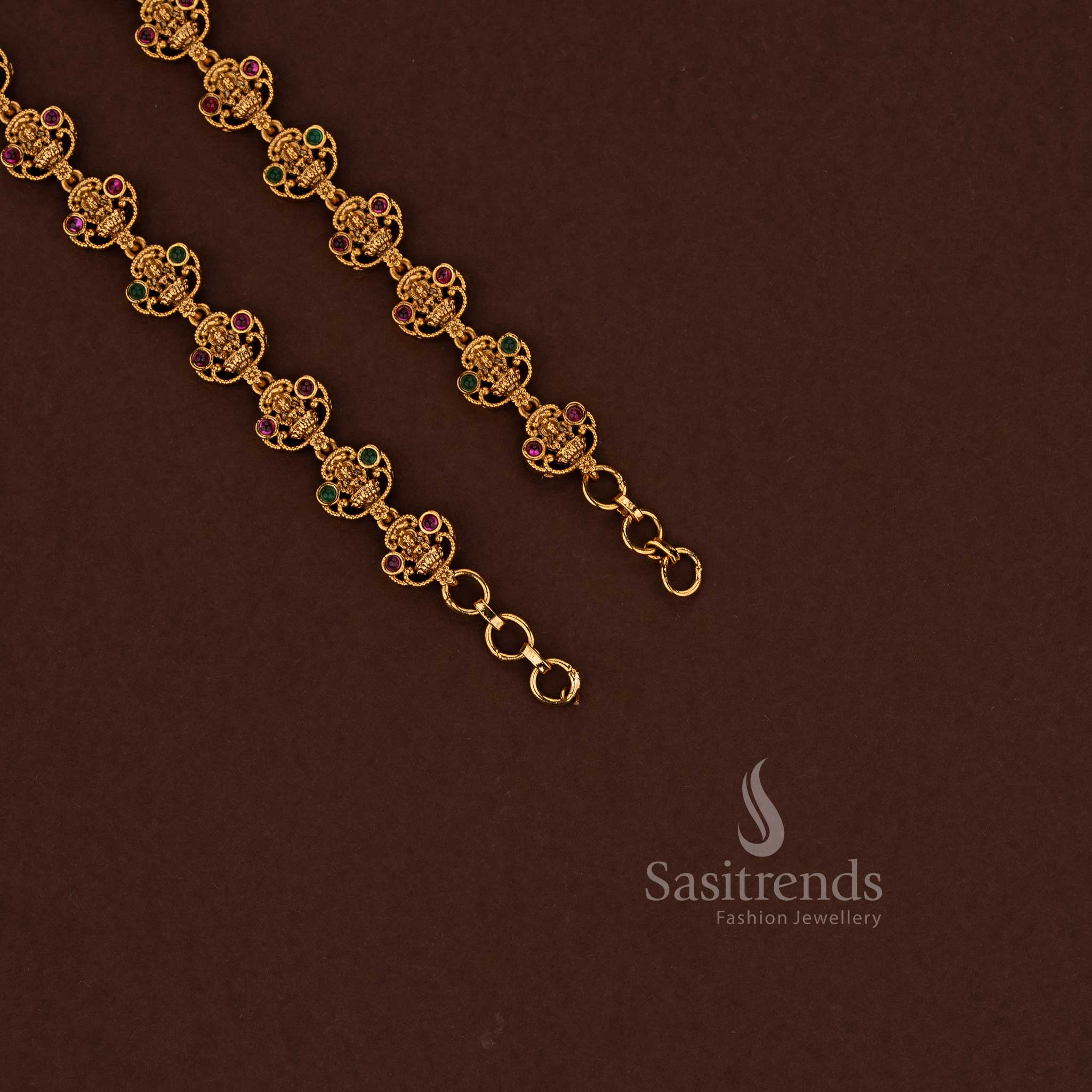 Elegant ruby-green temple premium matte gold plated filigree goddess Lakshmi matil ear chain ideal for festive saree wear, temple visits and celebration dressing - Sasitrends