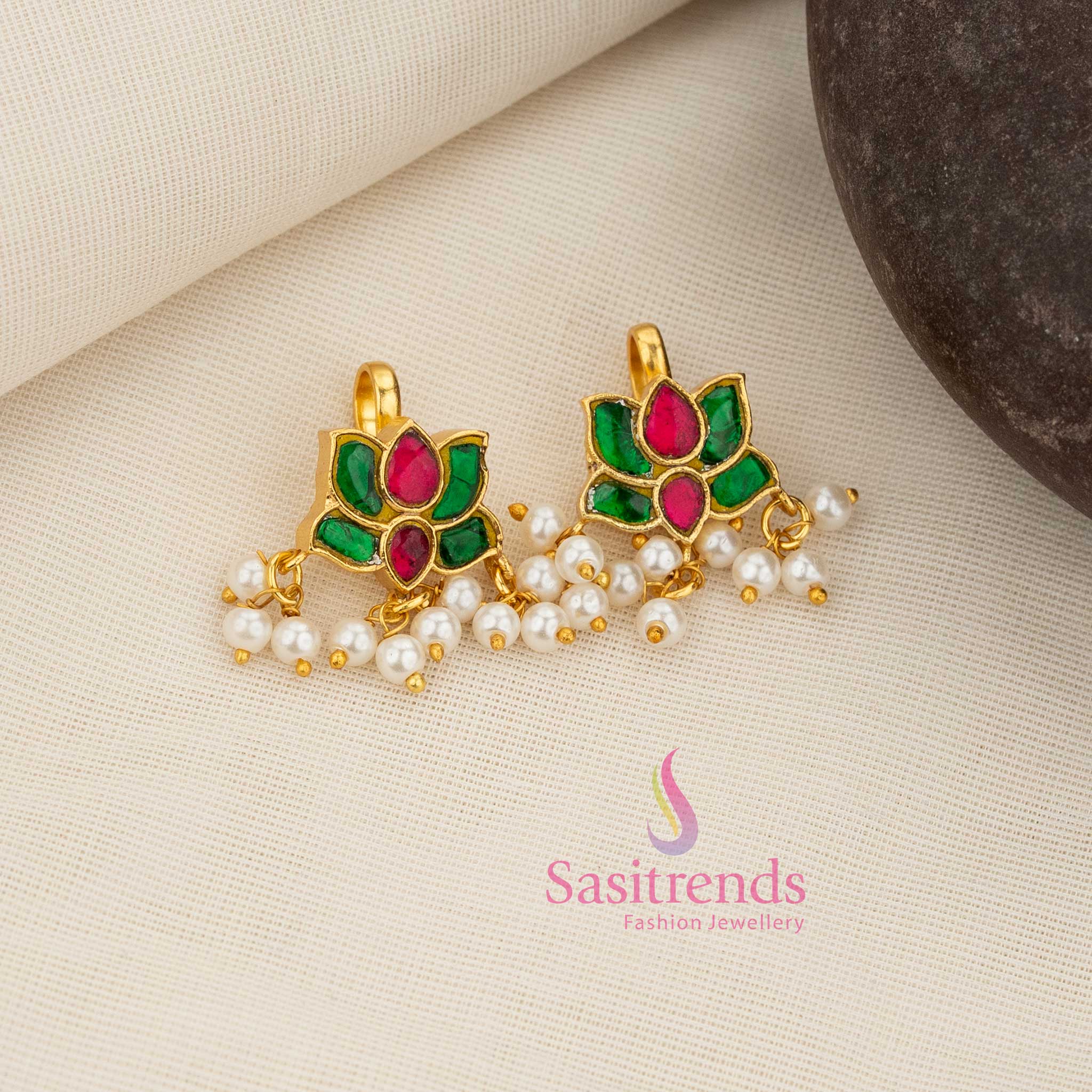 Majestic ruby-green Kundan lotus bugadi earcuff adorned with pearl drops creating a grand festive and cultural jewellery appearance – Sasitrends