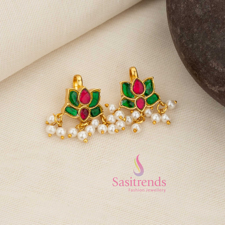 Majestic ruby-green Kundan lotus bugadi earcuff adorned with pearl drops creating a grand festive and cultural jewellery appearance – Sasitrends
