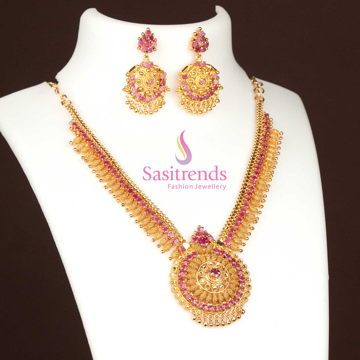 Radiant ruby circular AD pendant necklace with coordinated earrings, micro gold plated and adorned with golden bead accents for eye-catching celebrations – Sasitrends