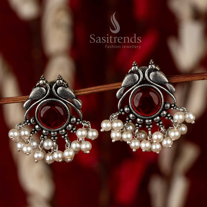 Vinous Monalisa stone inlaid in oxidised silver peacock earrings with pearl adornments