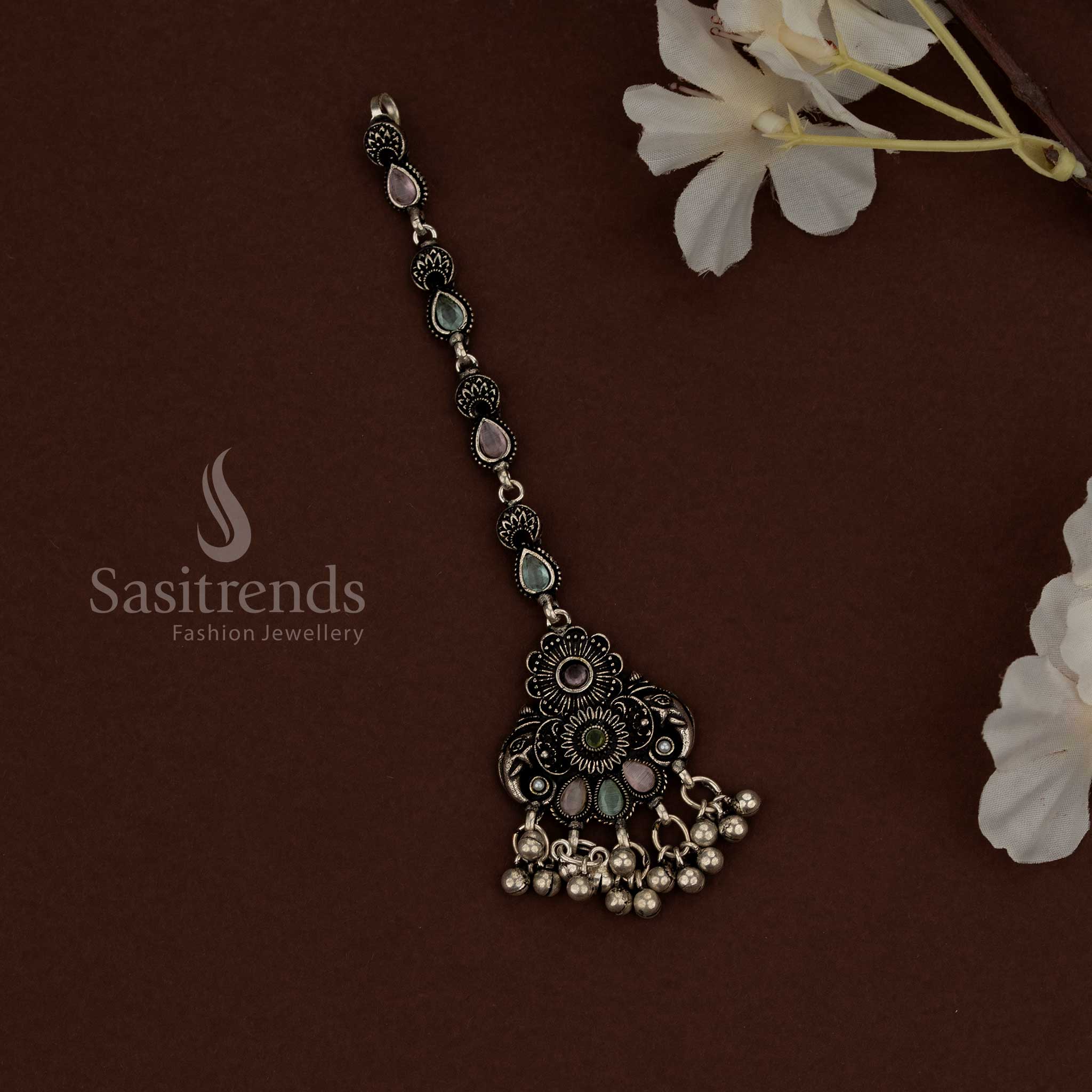Authentic Kolapuri oxidised maang tikka with rustic tribal essence for traditional Navaratri wear - Sasitrends