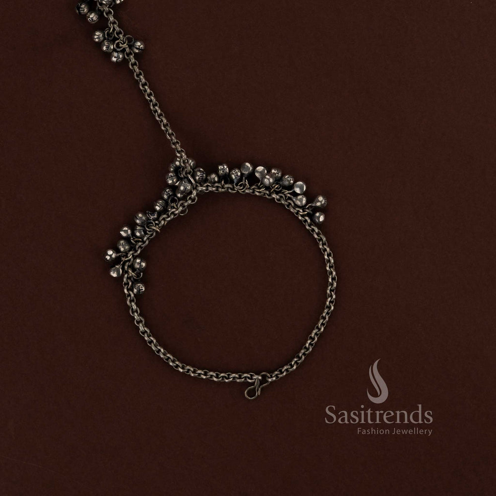 Boho inspired oxidised silver ghungroo anklet haath phool with chain toe ring ideal for Navaratri celebrations folk dance outfits and ethnic fashion looks - Sasitrends