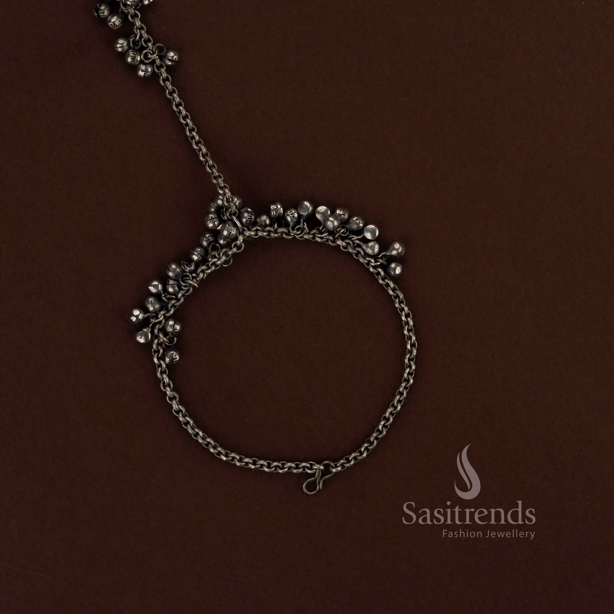 Boho inspired oxidised silver ghungroo anklet haath phool with chain toe ring ideal for Navaratri celebrations folk dance outfits and ethnic fashion looks - Sasitrends