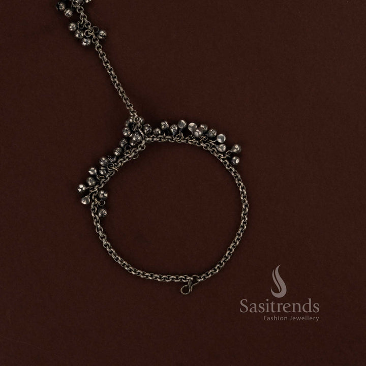 Boho inspired oxidised silver ghungroo anklet haath phool with chain toe ring ideal for Navaratri celebrations folk dance outfits and ethnic fashion looks - Sasitrends