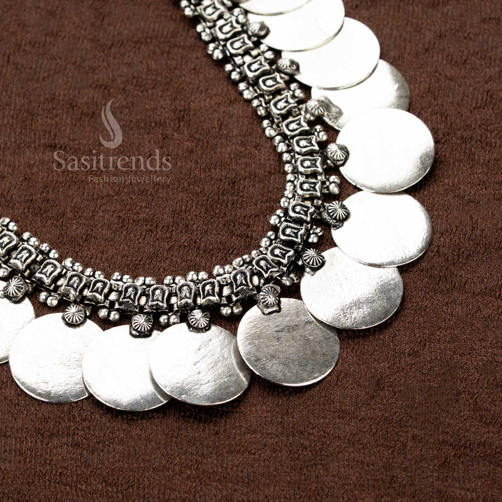 Regal oxidised silver floral motif choker necklace set designed with raised dome medallions, antique ballwork, and artistic detailing, a must-have jewellery piece for Navaratri - Sasitrends
