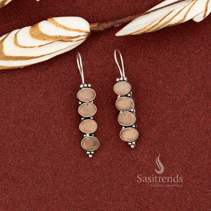 Earthy brown oxidised vertical oval earrings designed for casual walks and night events – Sasitrends