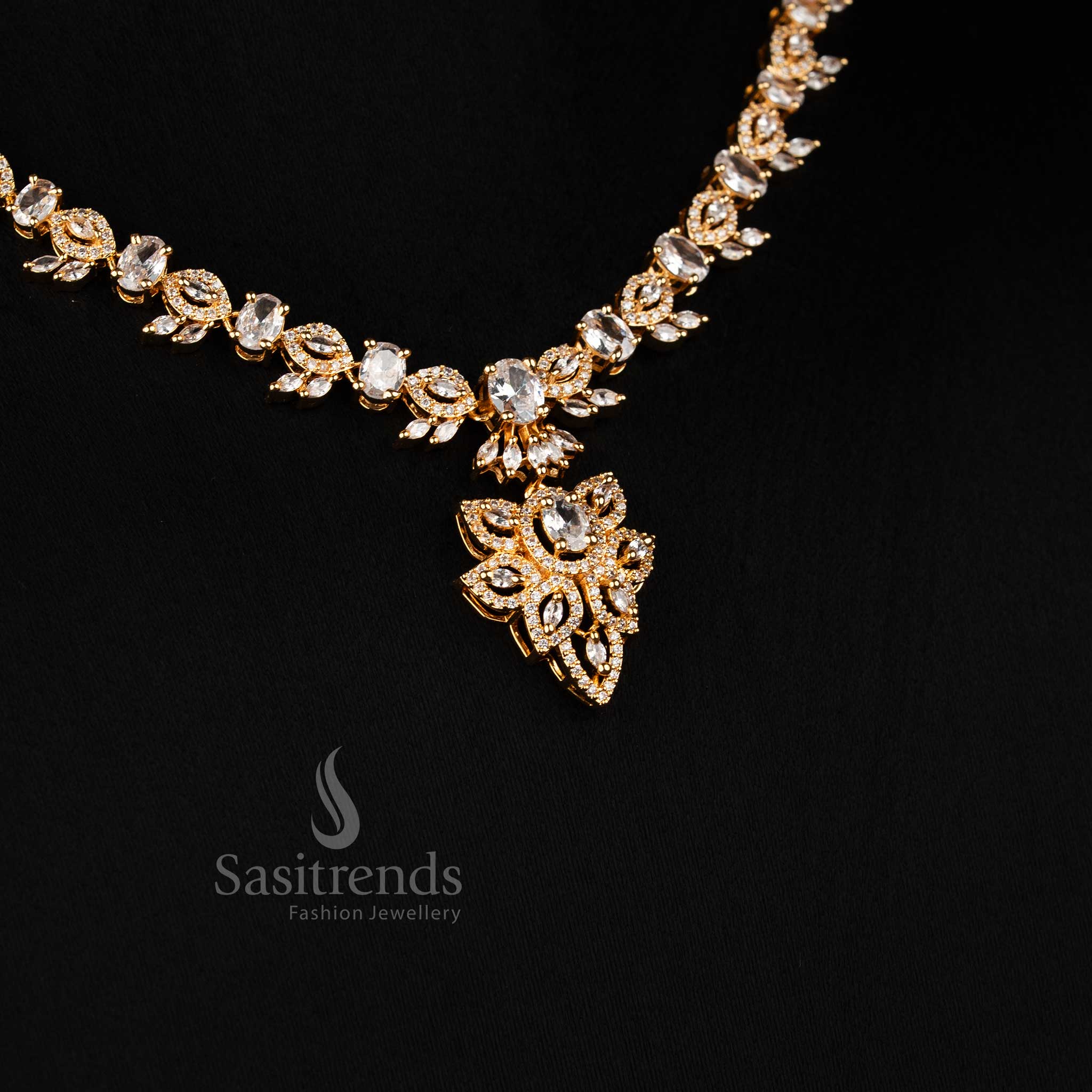 Elegant white floral leaf American diamond micro gold plated necklace set with oval stone highlights, luxurious jewellery styled like real gold for festive occasions - Sasitrends