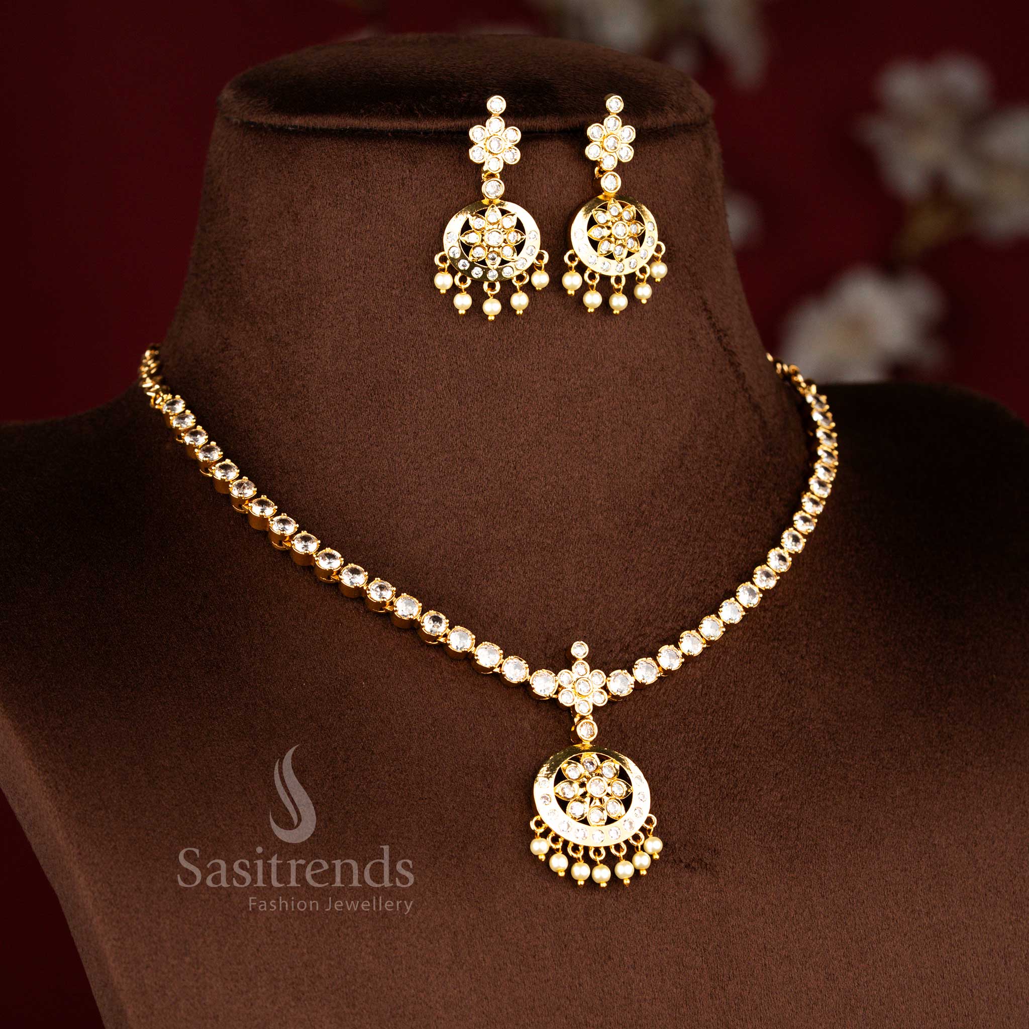 Elegant white American diamond matte gold plated floral pendant traditional attigai necklace set including necklace and earrings suitable for wedding rituals and traditional festive events – Sasitrends