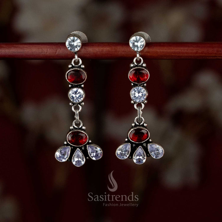 White-red oxidised silver earrings with a refined vertical stack and layered floral drop detailing – Sasitrends