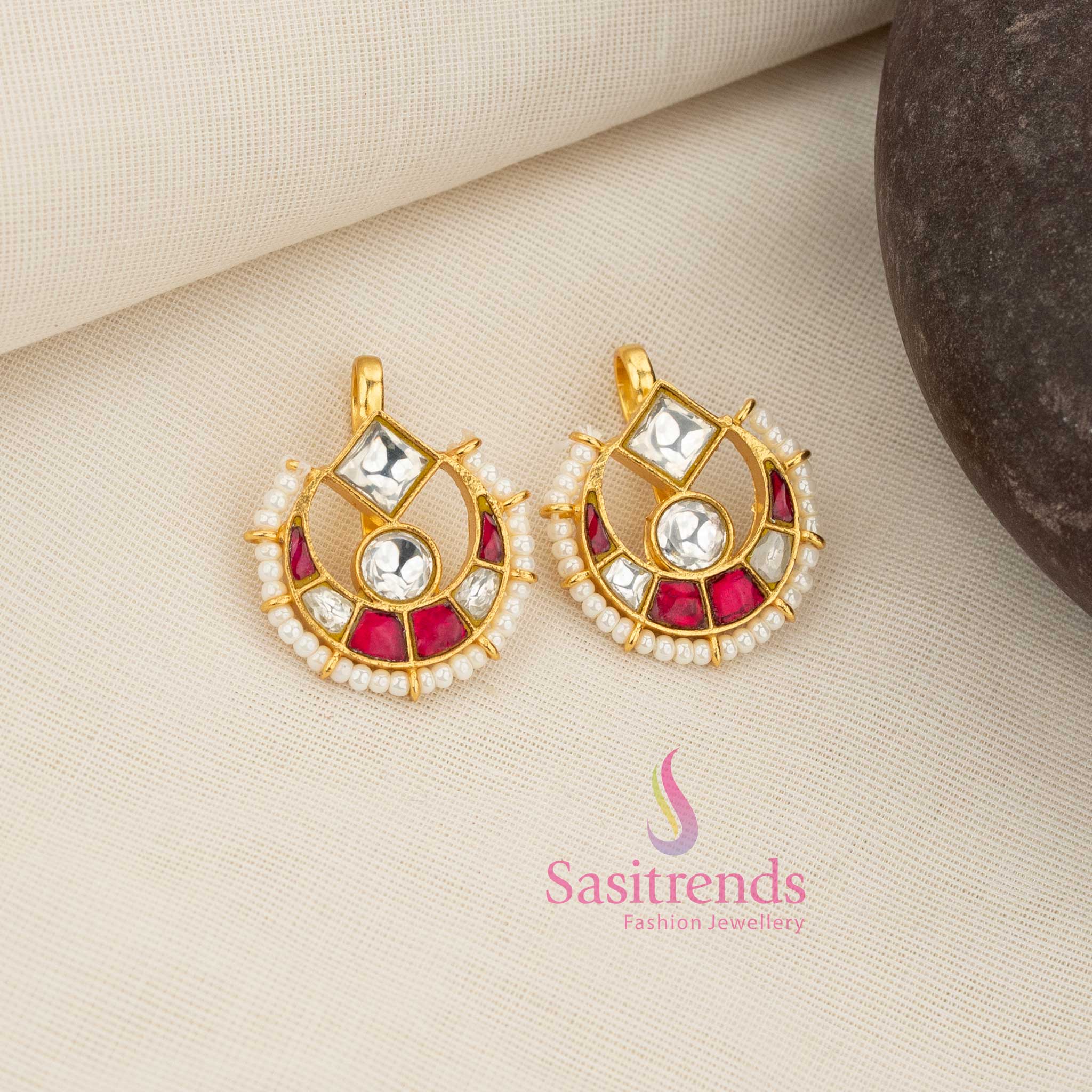 Radiant white-ruby 24K Jadau Kundan half moon bugadi earcuff earrings adorned with square and round stones and pearl danglers, ideal for wedding-related functions, grand festive styling and cultural attire - Sasitrends