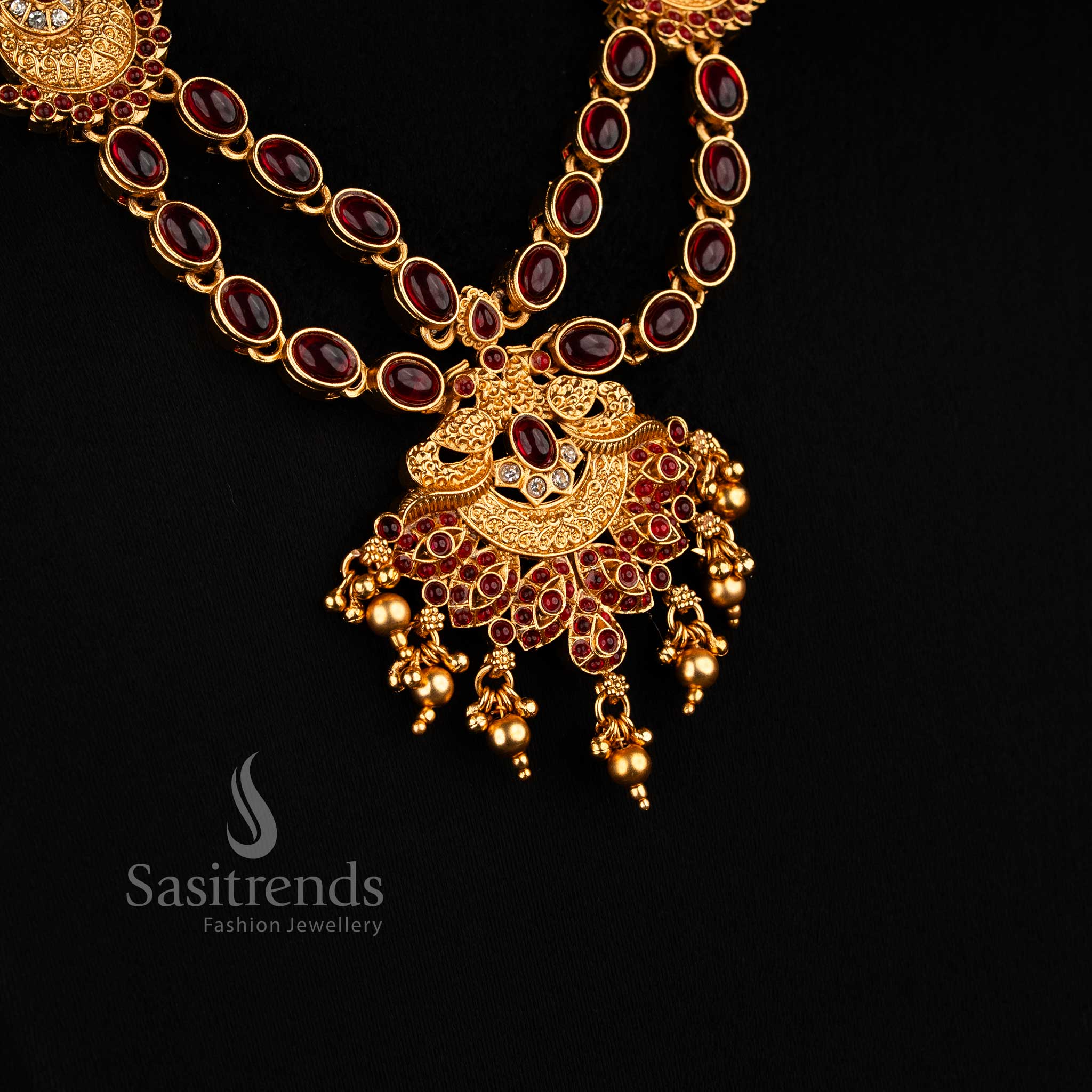 Classic matte gold plated dual peacock necklace set with oval and teardrop stones, golden beads in white-ruby colours, perfect for festive and ethnic wear jewellery – Sasitrends