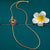 New White Ruby Mugappu Chain design with a Beautiful AD Stones Peacock Motif and Luxurious Gold Plating