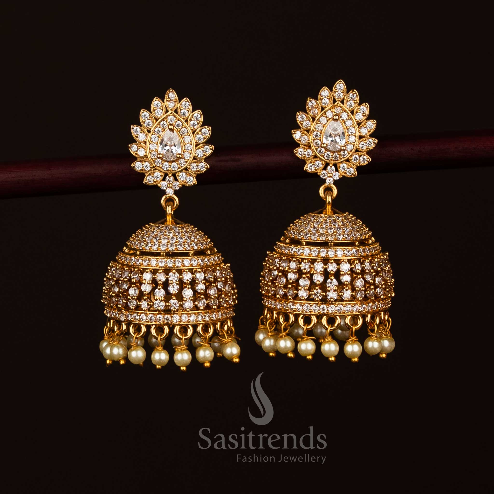 Classic white matte gold plated temple teardrop AD stone jhumka earrings for traditional ceremonies - Sasitrends