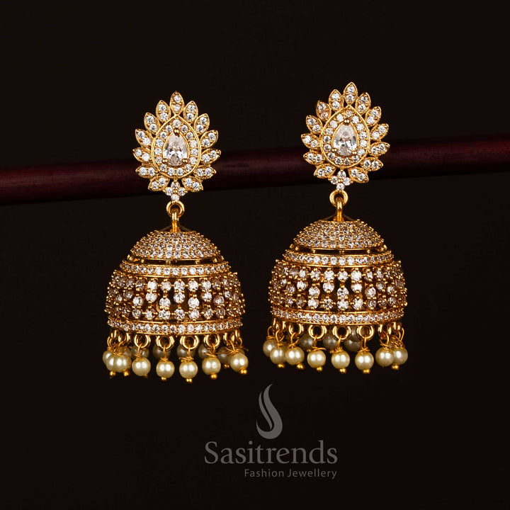 Classic white matte gold plated temple teardrop AD stone jhumka earrings for traditional ceremonies - Sasitrends