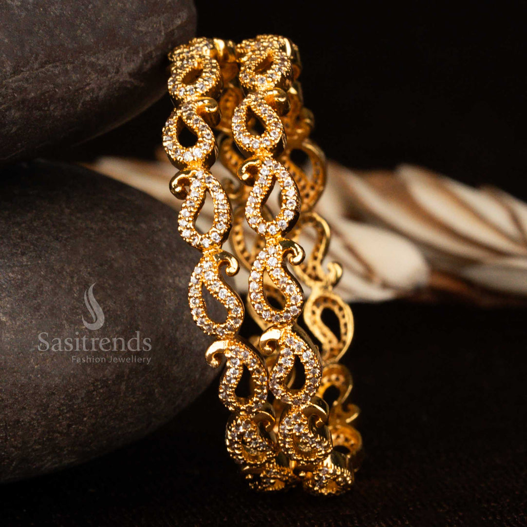 One-year guaranteed micro gold plated mango motif bangles embedded with white CZ stones – a luminous blend of ethnic elegance and fine craftsmanship in traditional jewellery by Sasitrends