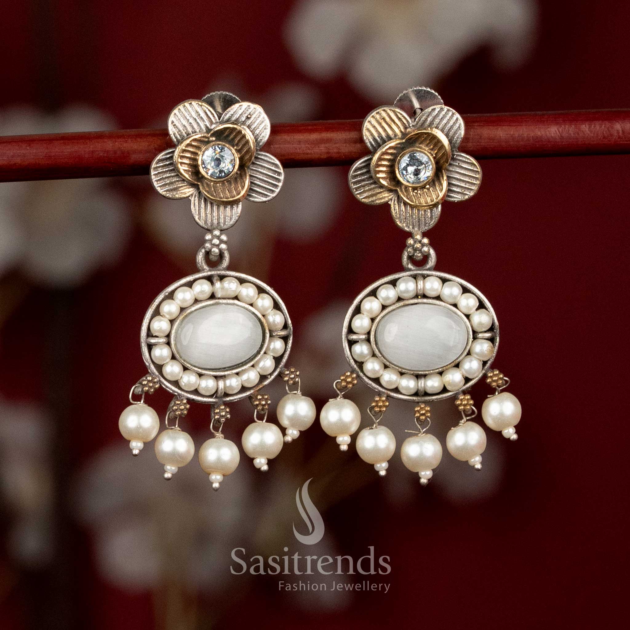 Exquisite oxidised silver floral stud earrings featuring white Monalisa stones and delicate pearl accents for refined festive wear - Sasitrends