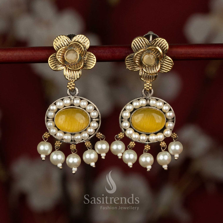 Antique dual tone 92.5 silver oxidised floral stud earrings with oval Monalisa stone - Sasitrends