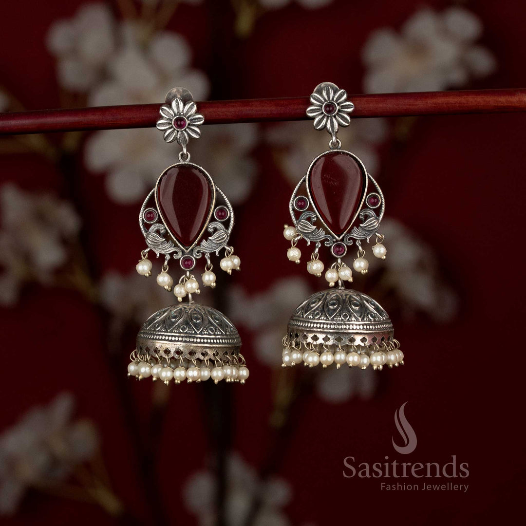 Antique oxidised peacock floral teardrop jhumkas with pearl detailing for modern ethnic wear - Sasitrends