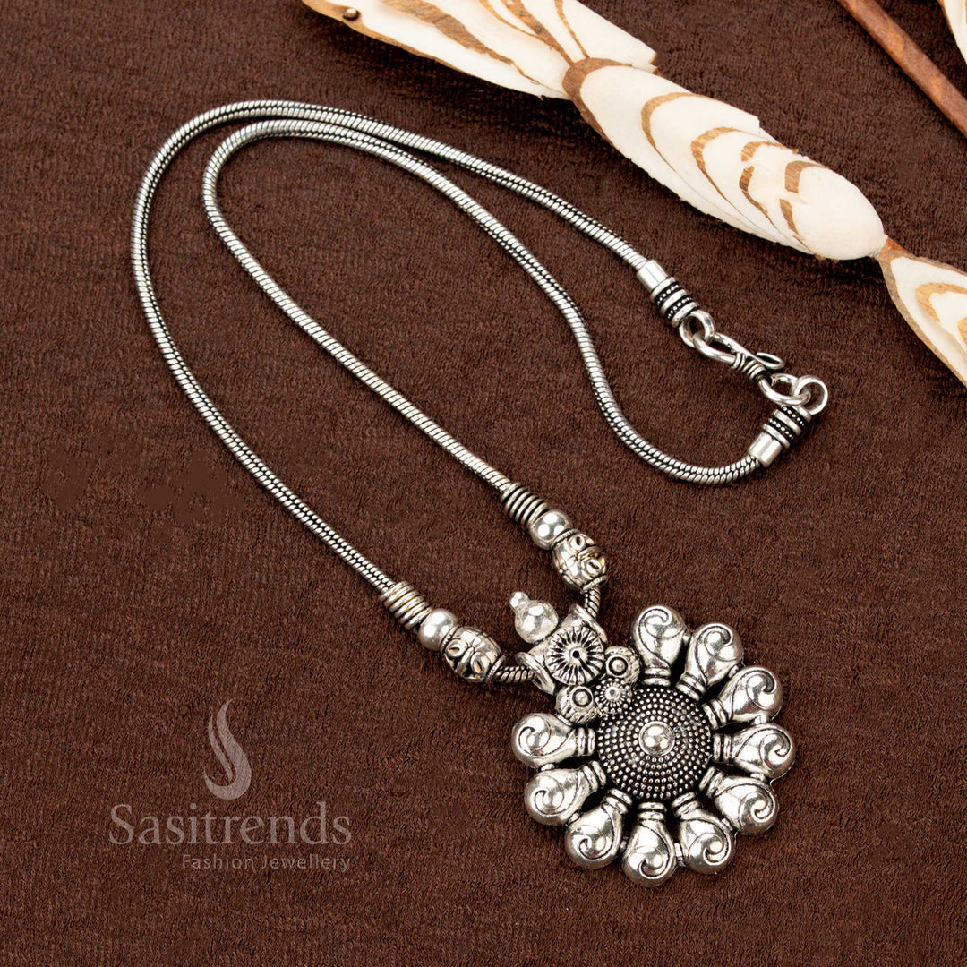 Divine whirl oxidised silver necklace showcasing a striking floral spiral pendant with dainty beaded details—a unique ethnic jewellery treasure crafted for Navaratri and festive traditions - Sasitrends