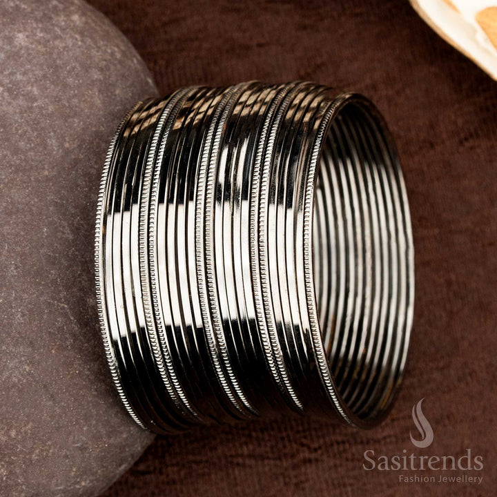Elegant oxidised black finish bangles set featuring classic simplicity and a subtle traditional flair, specially created for daily ethnic jewellery style and effortless festive dressing by Sasitrends
