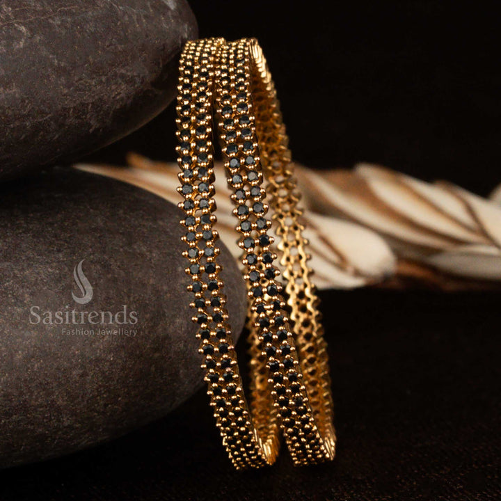 Elegant black stone American diamond bangles with micro gold plating, exuding unique grace and modern ethnic flair, backed by a 1-year guarantee from Sasitrends
