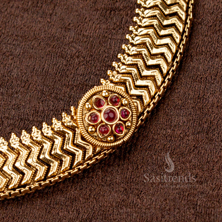 Antique gold plated designer necklace set adorned with ruby AD stones in round floral motifs, perfect for traditional and festive wear with an intricate design - Sasitrends