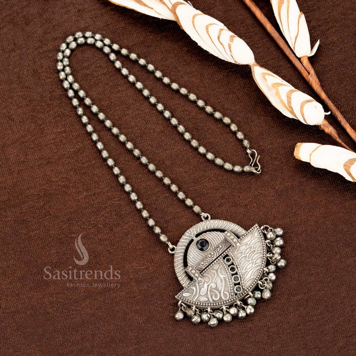 Boho-inspired oxidised silver necklace with black bead hangings and traditional pendant engraving, an ideal fusion jewellery piece – Sasitrends