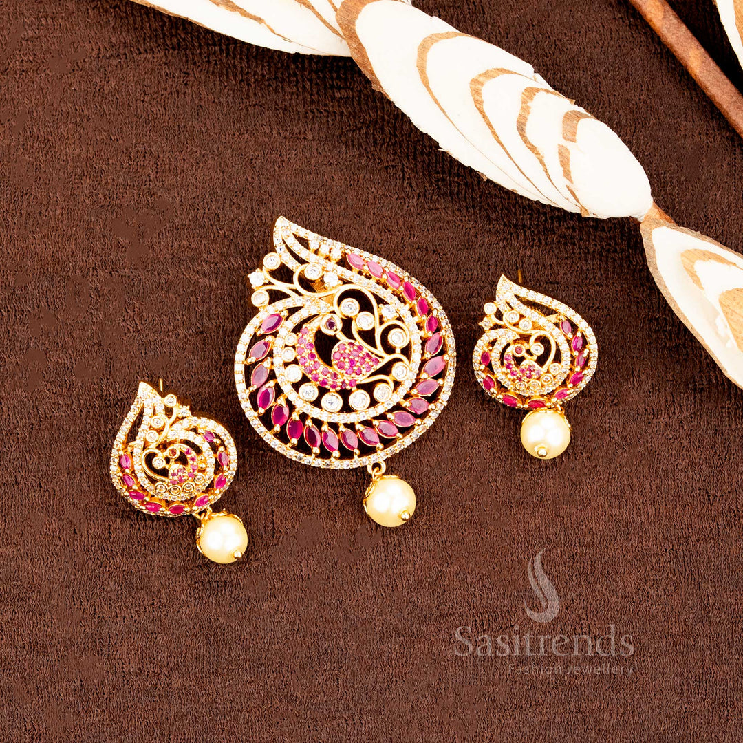Micro gold plated traditional peacock pendant set featuring sparkling white and ruby AD stones, paired with elegant earrings and a divine heritage finish, ideal for temple-inspired ethnic jewellery styling by Sasitrends