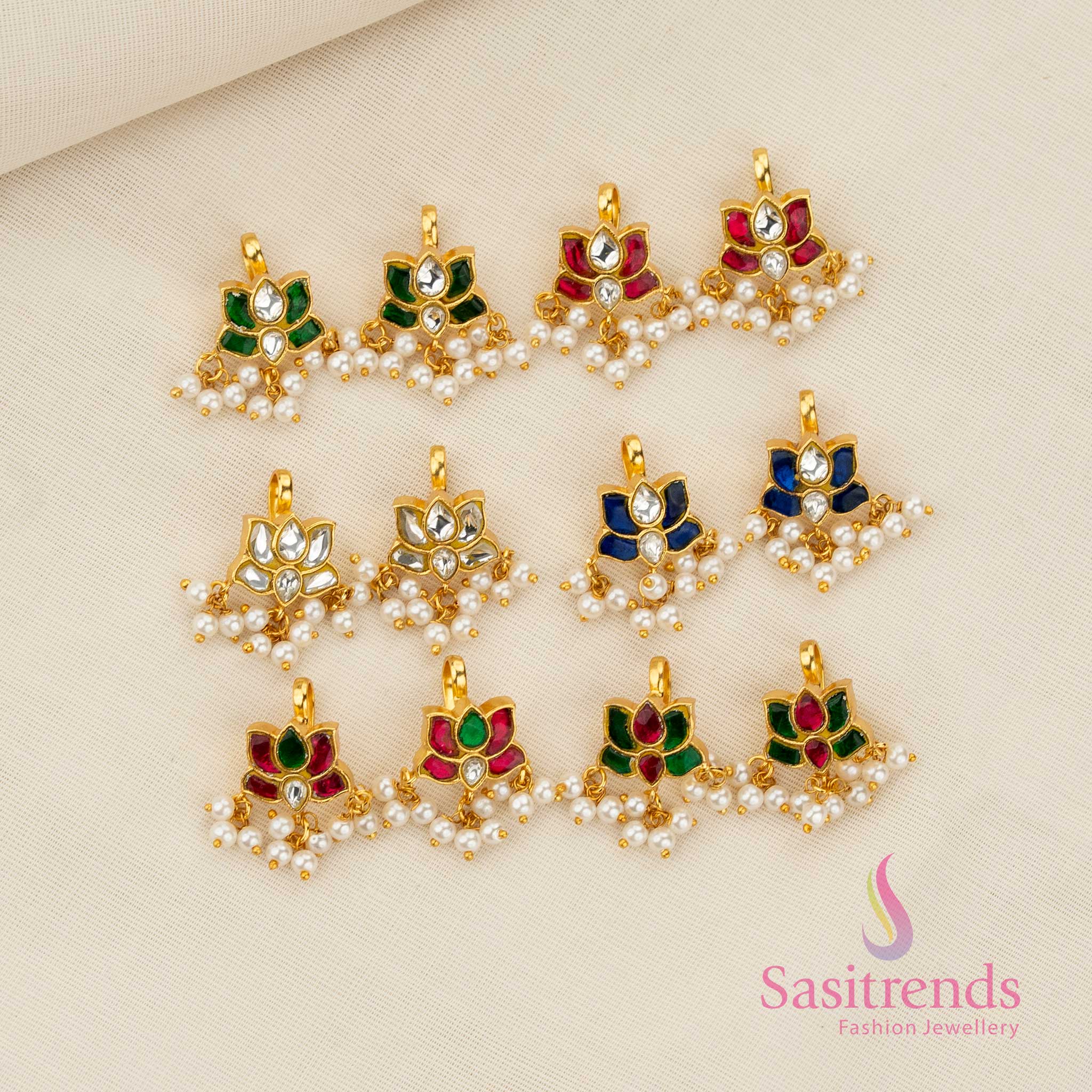 Collection of Kundan lotus bugadi earcuff adorned with pearl drops creating a grand festive and cultural jewellery appearance – Sasitrends