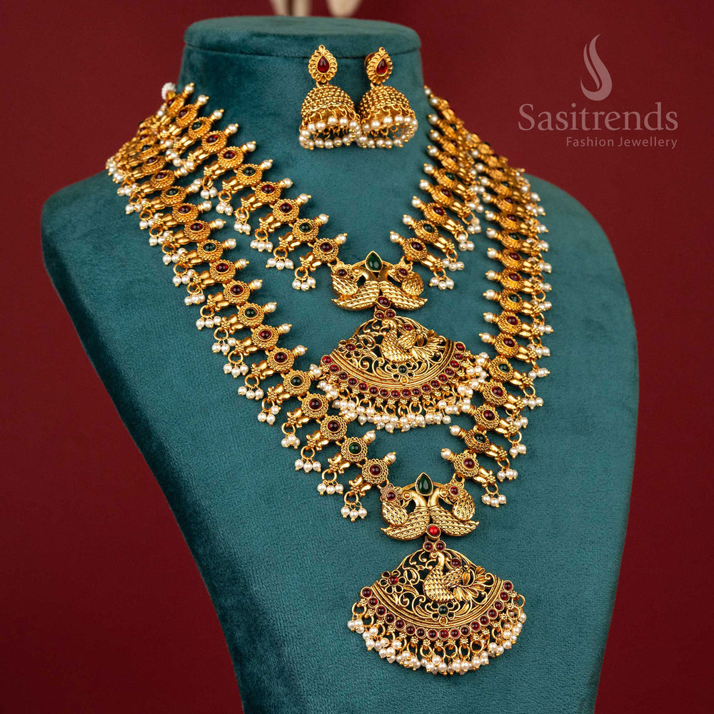 Dual-tone ruby-green stone peacock combo necklace with matte gold finish – beautiful traditional haram jewellery for grand occasions – sasitrends