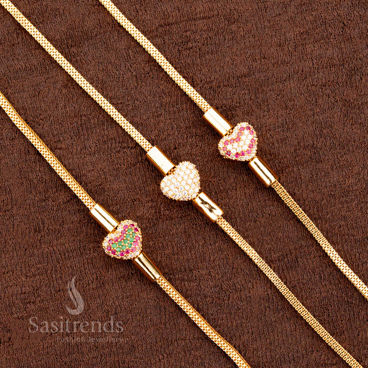 Vibrant multi-hue Mugappu chain with heart design and striking pink stone, finished in micro gold for one gram jewellery lovers – perfect with ethnic sarees – sasitrends
