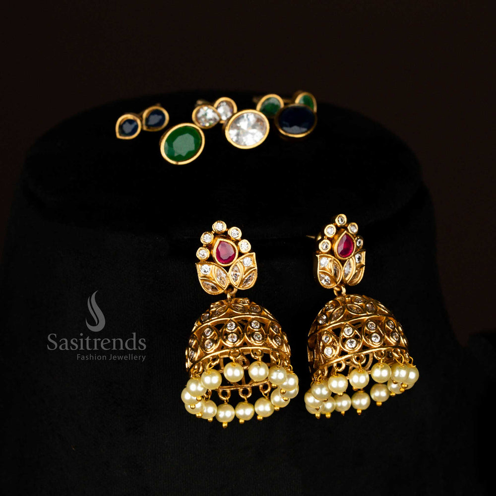 Elegant matte gold tone AD choker with interchangeable centrepiece and delicate temple leaf jhumkas – vibrant traditional jewellery for all looks – sasitrends