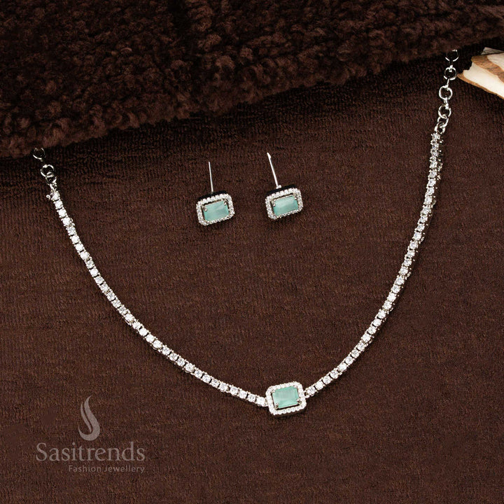 Mint green rectangular American diamond pendant necklace with rhodium-layered shine and sparkling matching earrings – a delicate and unique festive jewellery piece by Sasitrends