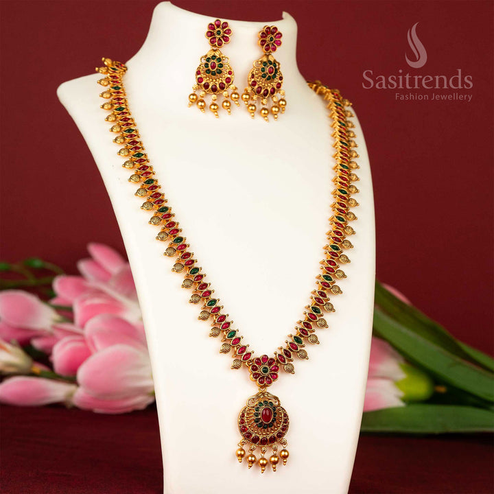 Temple flower haram necklace in ruby-green combination with matte gold finish – festive and rich traditional jewellery – sasitrends