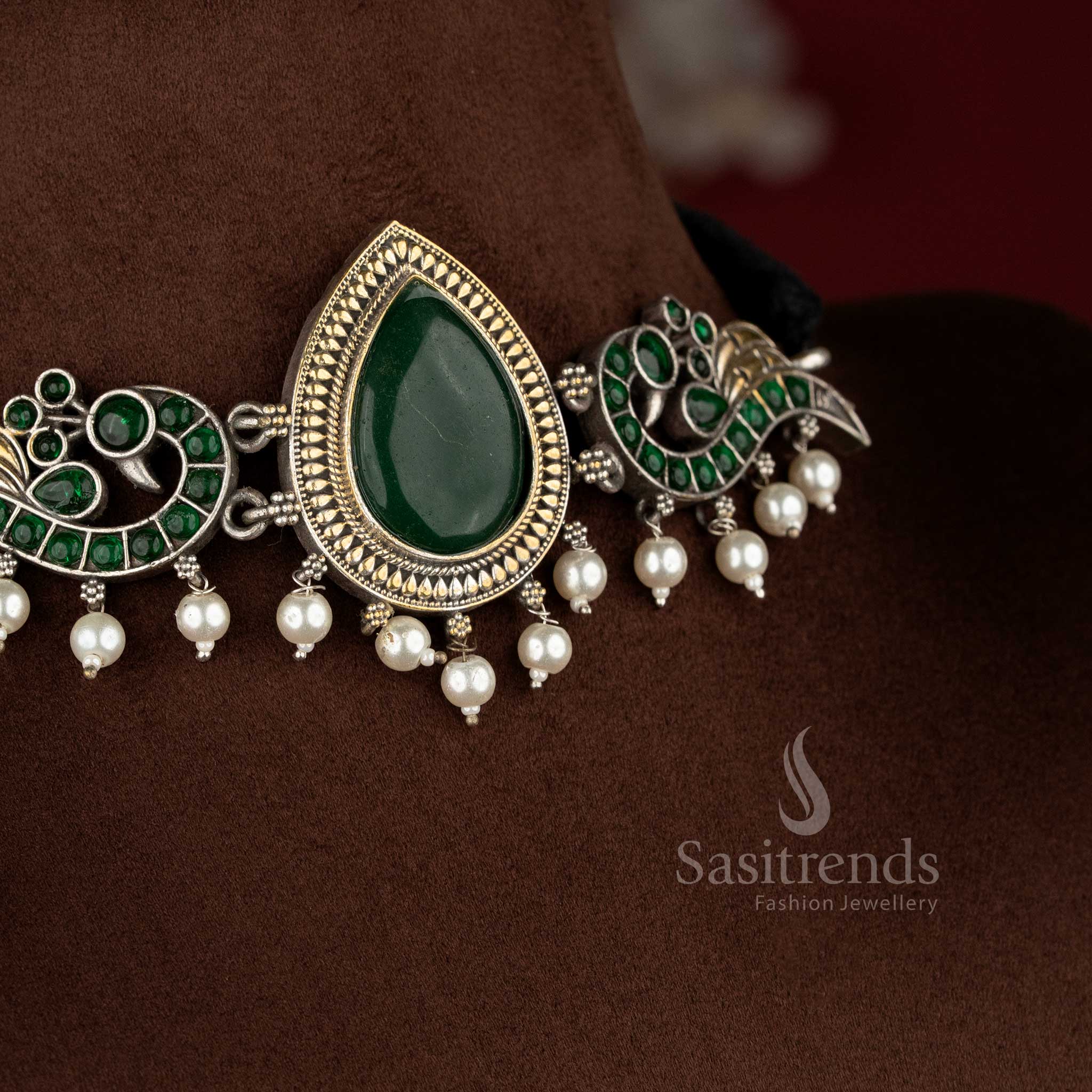 Traditional Dual tone antique oxidised 92.5 Silver green stone peacock motif choker jewellery set featuring structured design and matching earrings - Sasitrends
