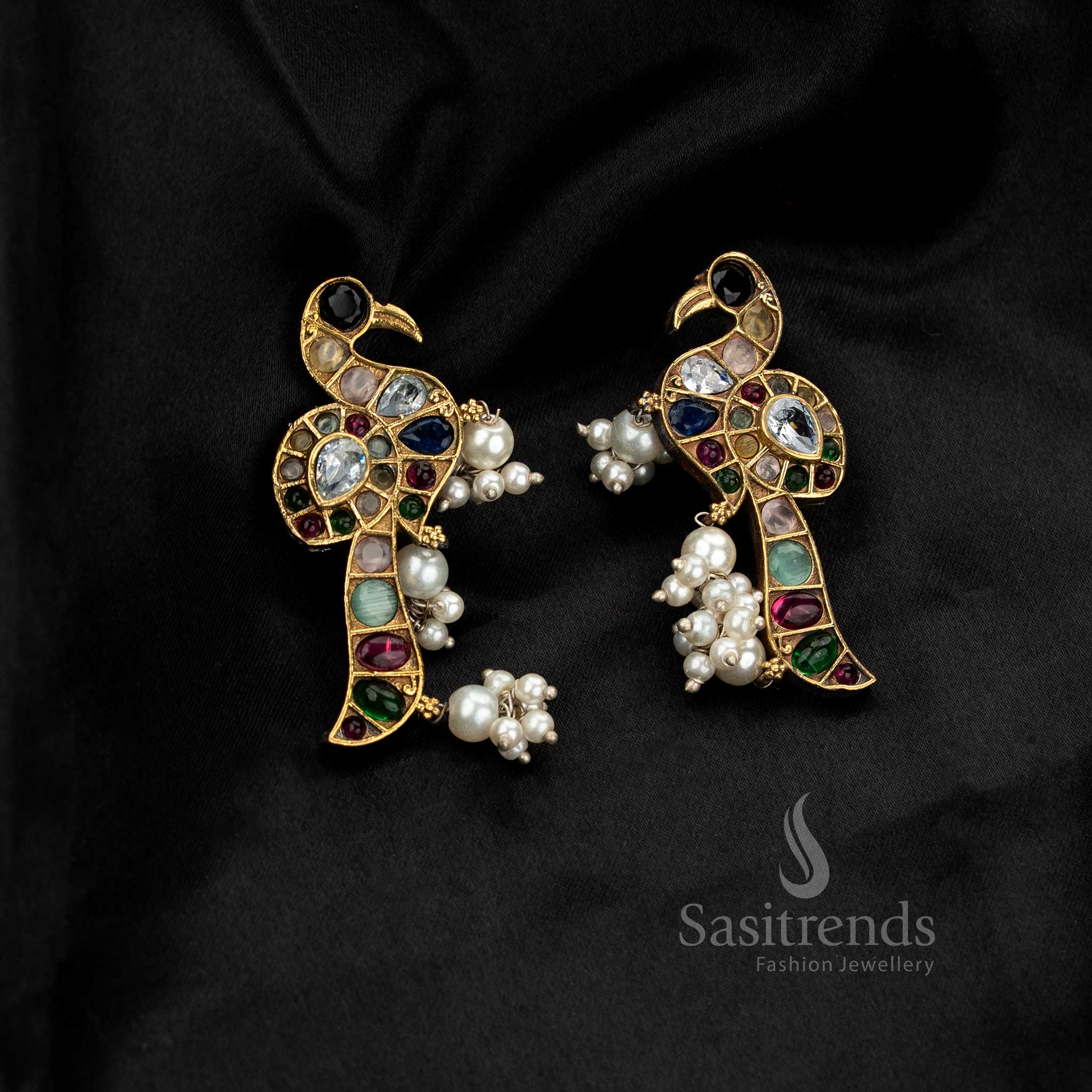 Striking antique oxidised dual-tone peacock earrings with pearl drop – Sasitrends