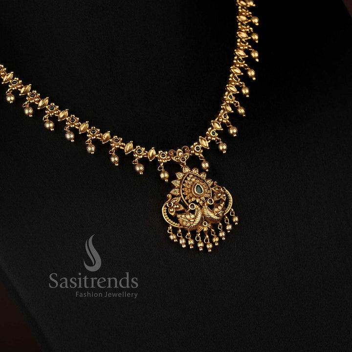 Elegant Matte Gold Temple Necklace with Dual Peacock and Floral Design for Festive Look – Sasitrends