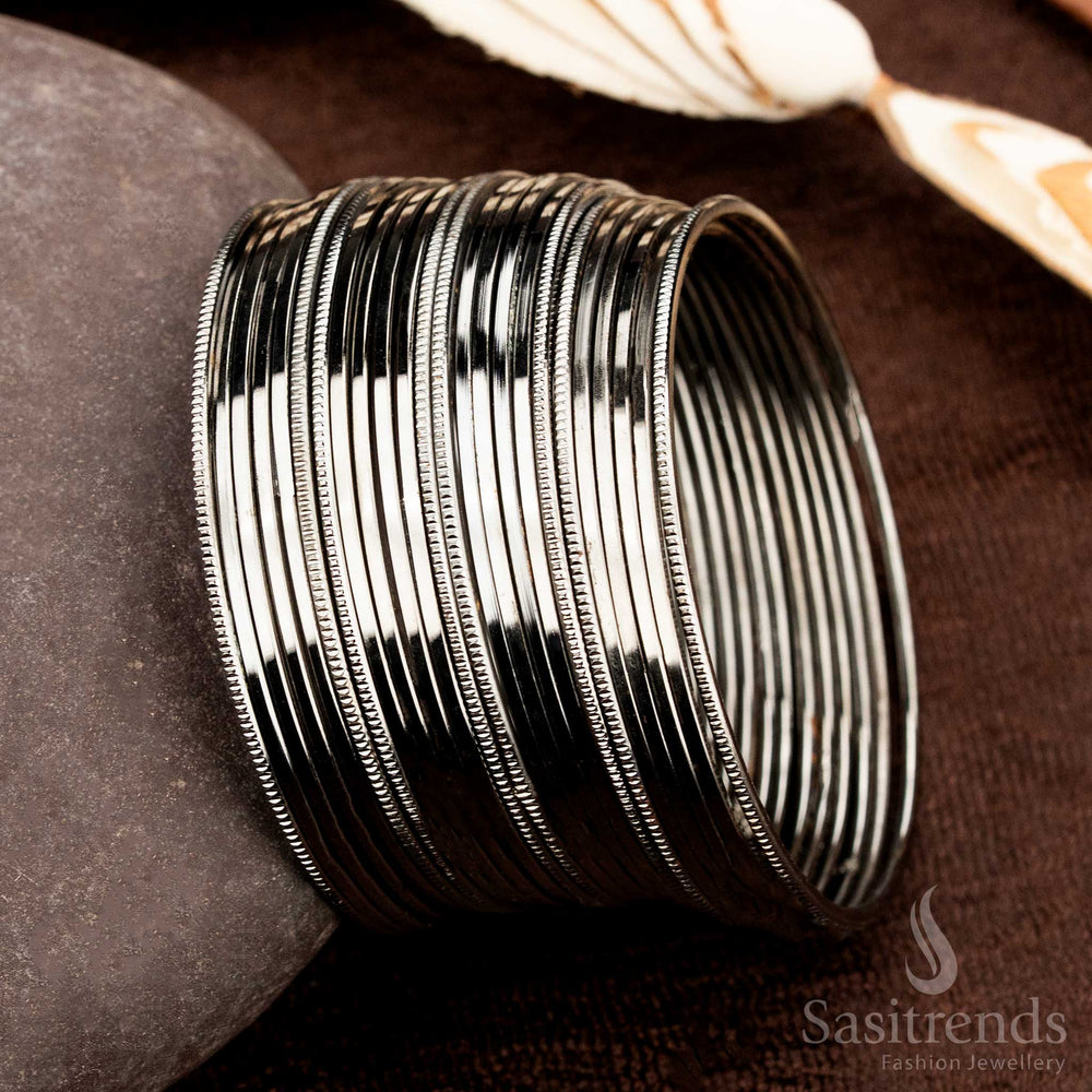 Chic oxidised black metal bangles set designed for casual wear, offering a bold yet elegant minimal jewellery statement, perfect for modern women embracing ethnic and everyday fusion by Sasitrends
