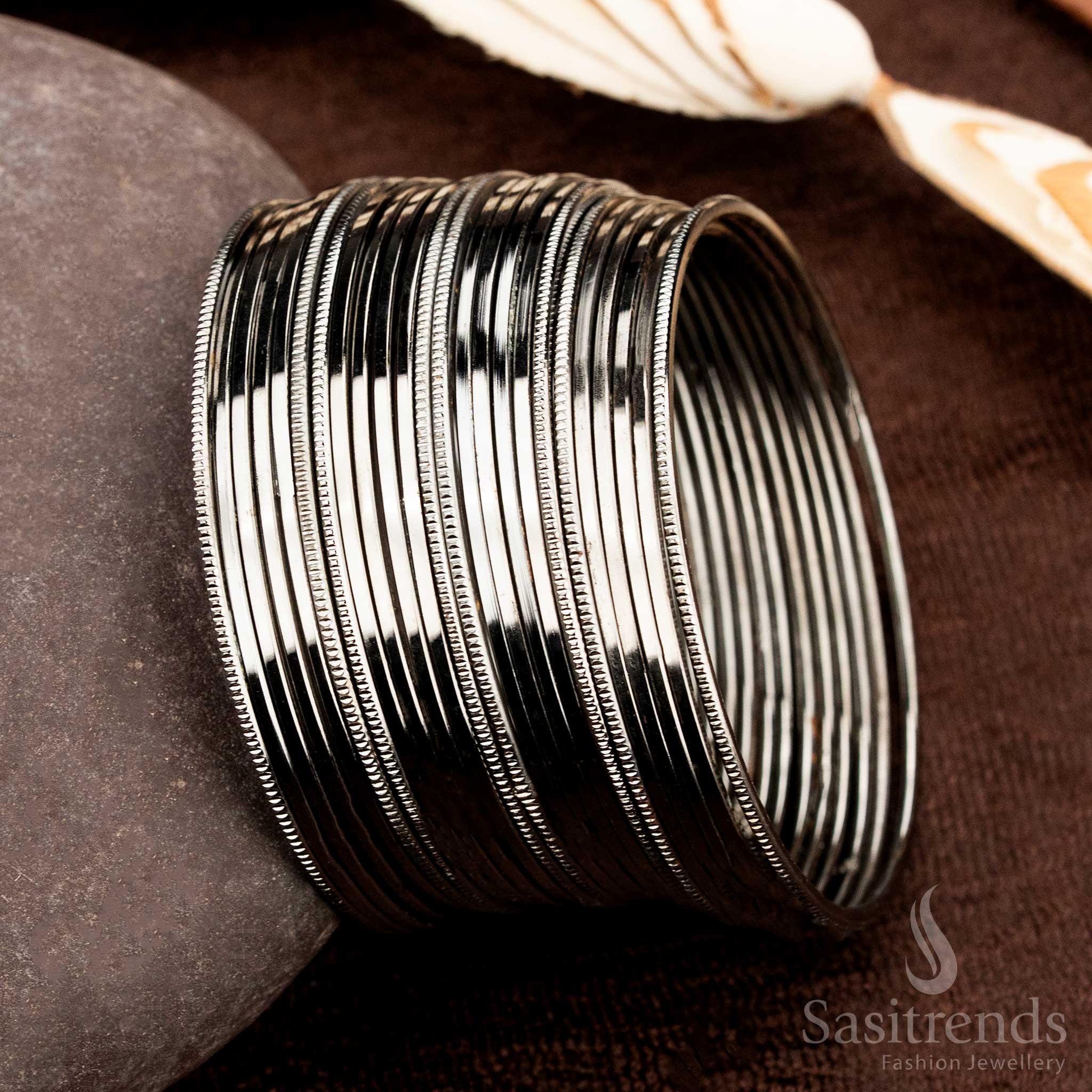 Chic oxidised black metal bangles set designed for casual wear, offering a bold yet elegant minimal jewellery statement, perfect for modern women embracing ethnic and everyday fusion by Sasitrends