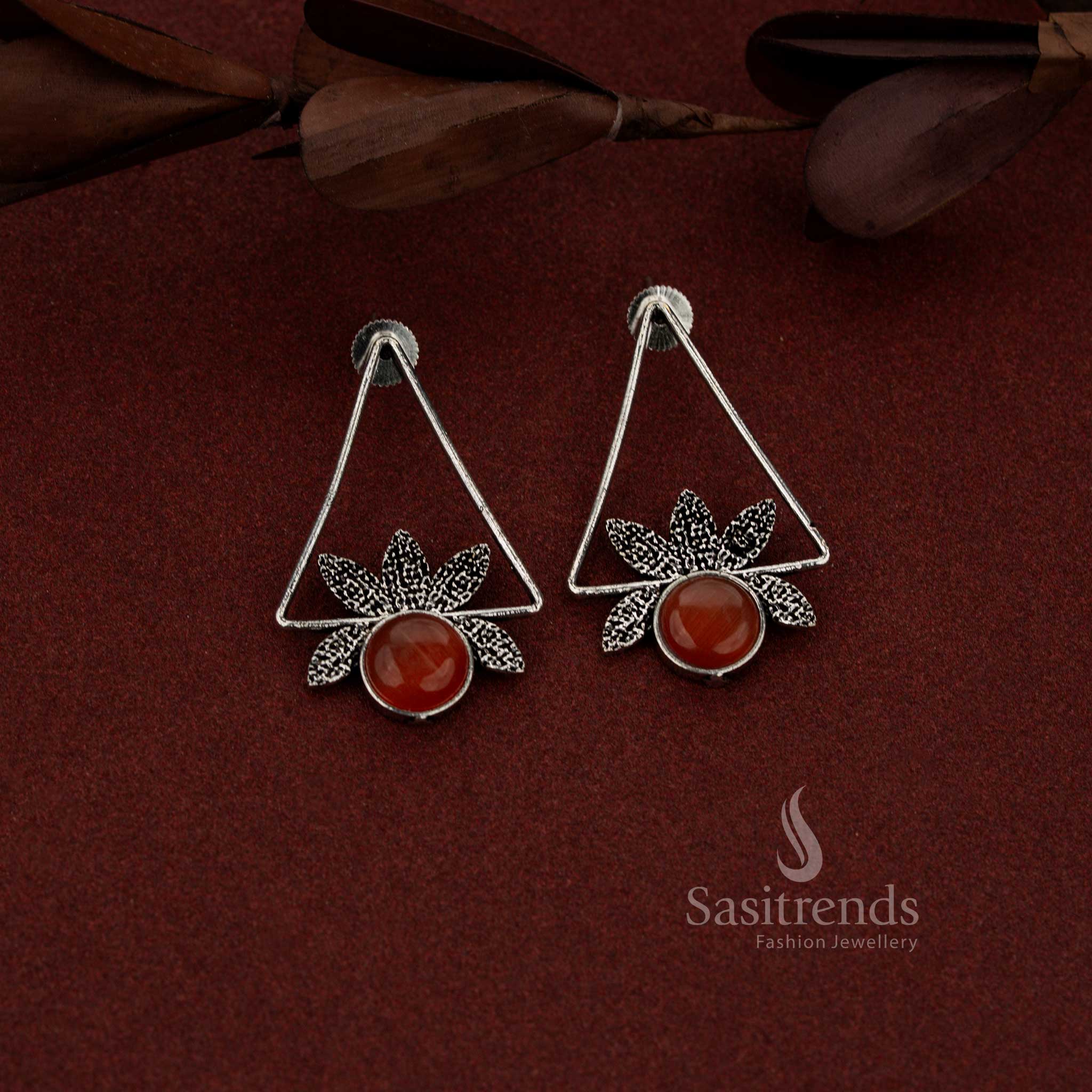 Elegant oxidised isosceles triangle earrings finished with neatly set round orange stones