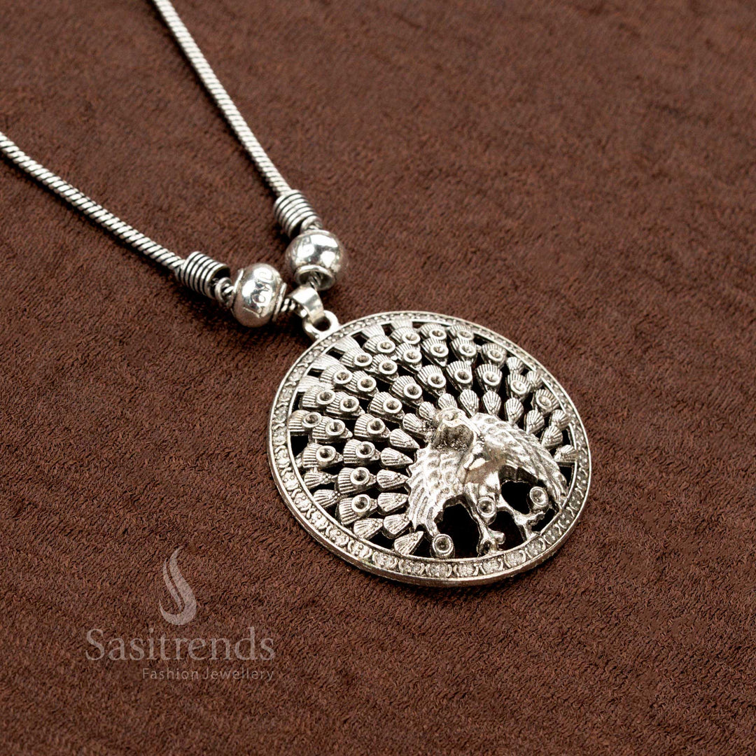 Artisanal oxidised chain necklace with a handcrafted full peacock motif, exuding traditional artistry and festive flair—ideal as a signature jewellery piece for Navaratri celebrations - Sasitrends