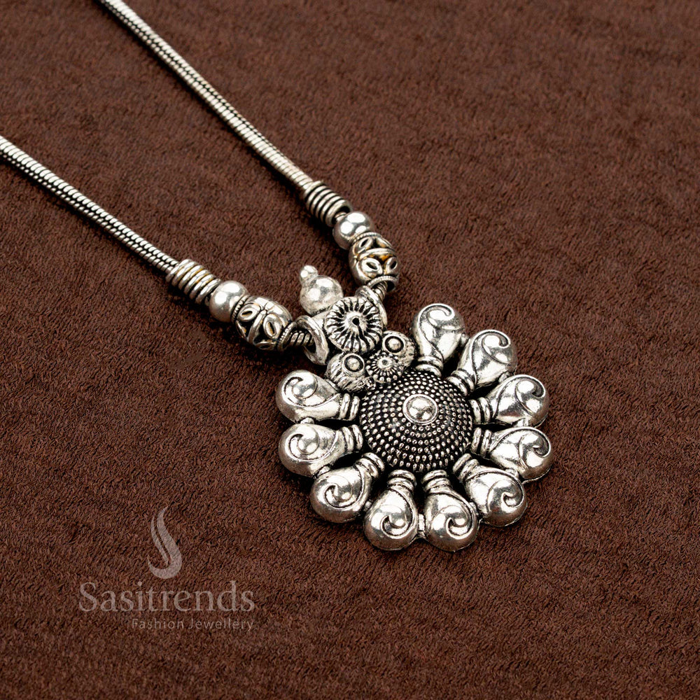 Artistic flair meets traditional elegance in this spiral floral oxidised necklace, complete with intricate beaded hangings—a distinctive temple-style jewellery piece for Navaratri occasions - Sasitrends