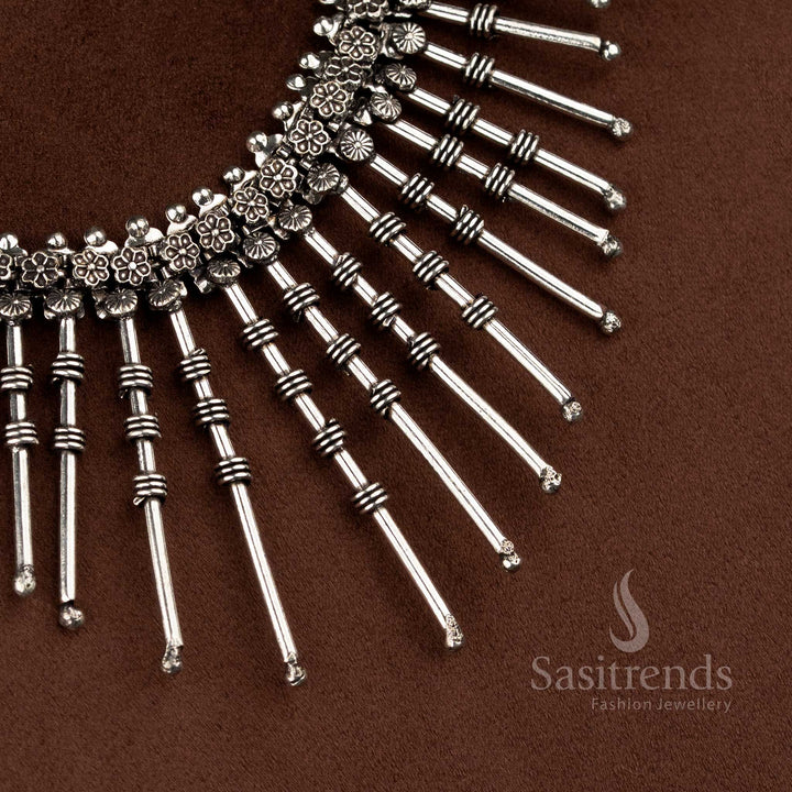 Floral engraved oxidised silver sunburst neckline necklace for festive wear